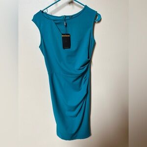Teal colored ruched side sheath dress.